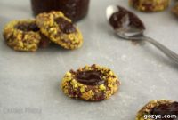 Infused Irish Cream Pistachio Chocolate Thumbprint Cookies