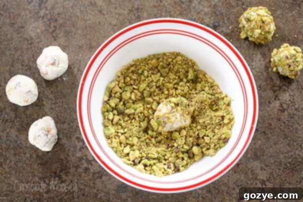Close-up of Goat Cheese, Bacon, and Pistachio Truffles on a platter