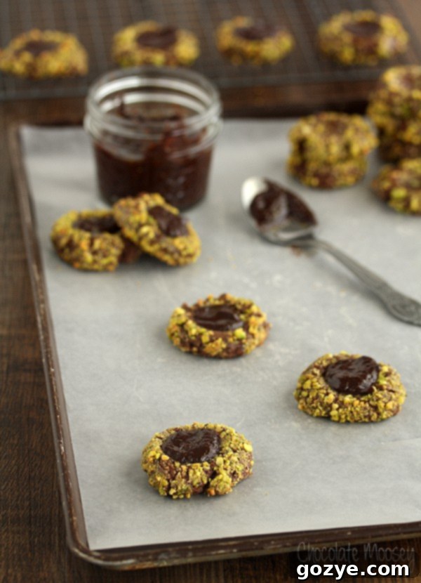 Rich Irish Cream and Pistachio Chocolate Thumbprint Cookies, perfect for St. Patrick's Day