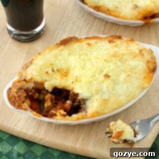 Shepherd's Pie with Guinness for Two 6 A beautifully presented Guinness Shepherd's Pie For Two, showcasing a golden mashed potato topping.