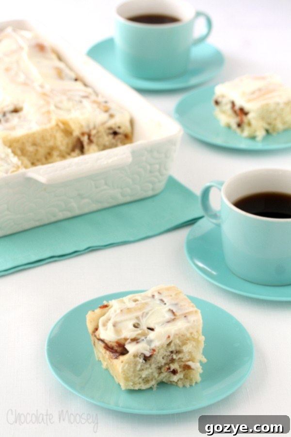 Close-up of baked Carrot Cake Cinnamon Rolls in a pan