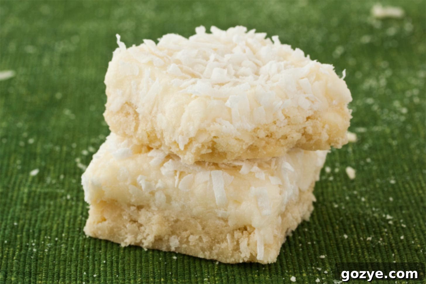 Coconut Shortbread Cookies stacked on each other