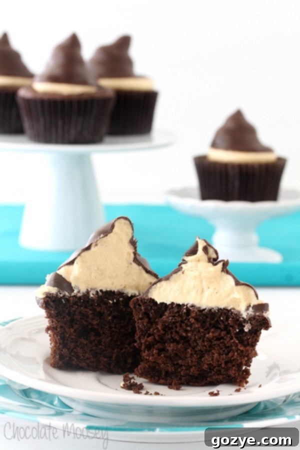 Tall swirls of caramel marshmallow frosting on chocolate cupcakes
