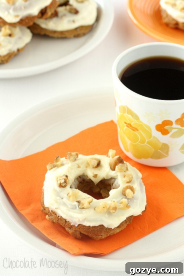 Freshly Baked Carrot Cake Doughnuts on a Cooling Rack