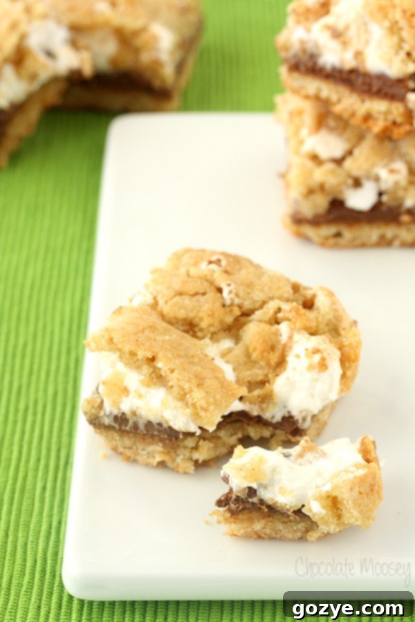 S'mores Cookie Bars 6 Stacked S'mores Cookie Crumb Bars on a plate