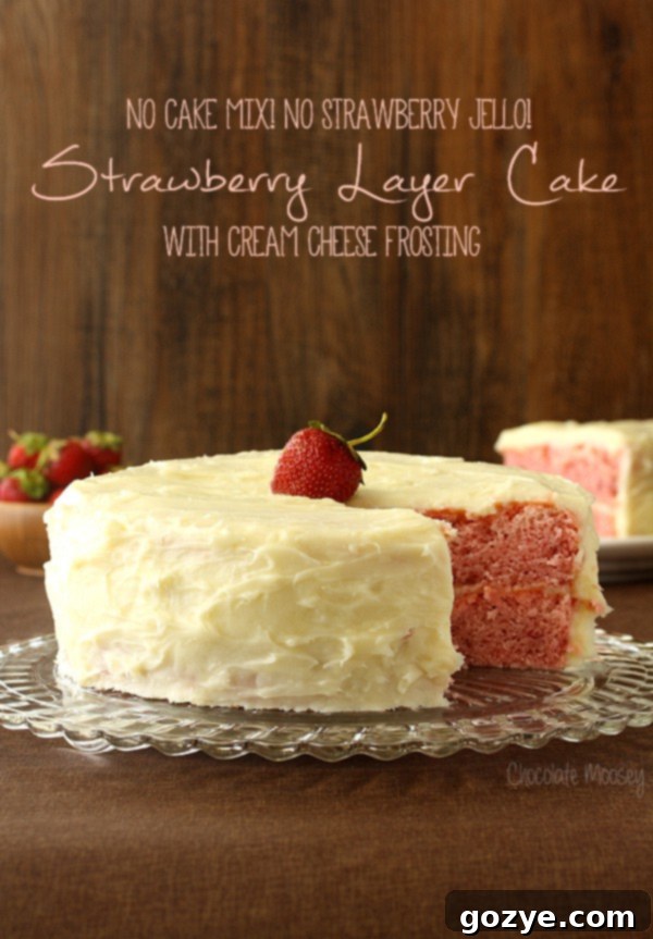 Perfect homemade two-layer strawberry cake with creamy cream cheese frosting, made without a mix or gelatin