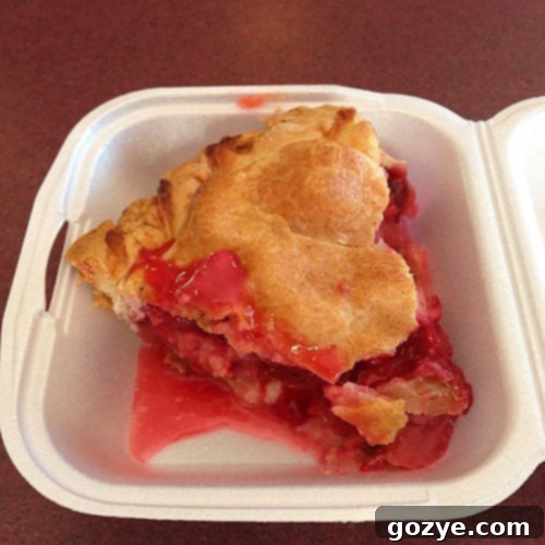 Slice of raspberry rhubarb jalapeno pie