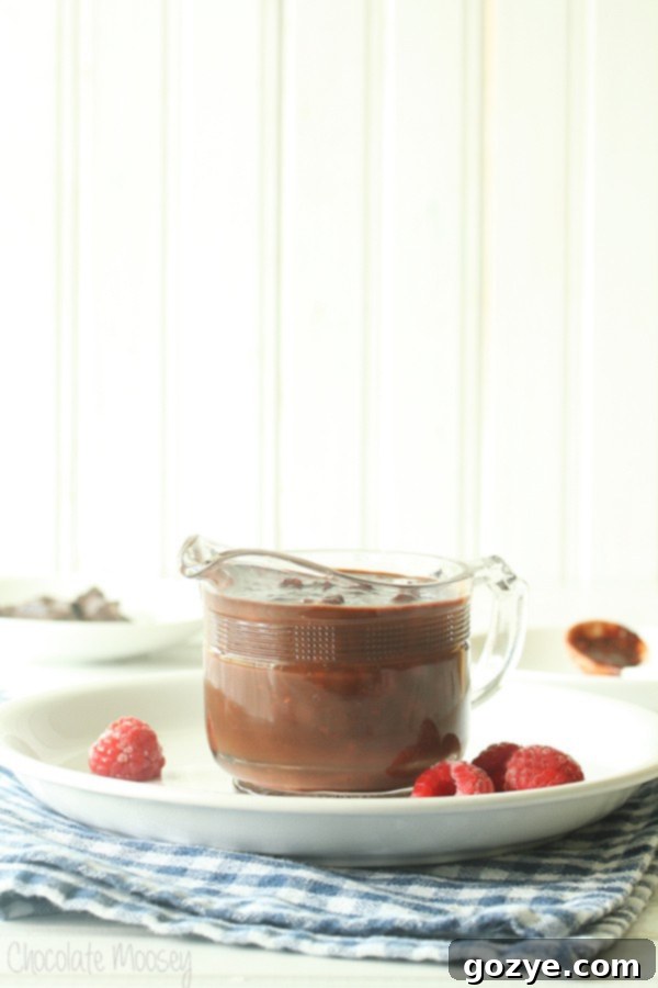 Raspberry Fudge Sauce - a super easy and quick chocolate sauce to top ice cream