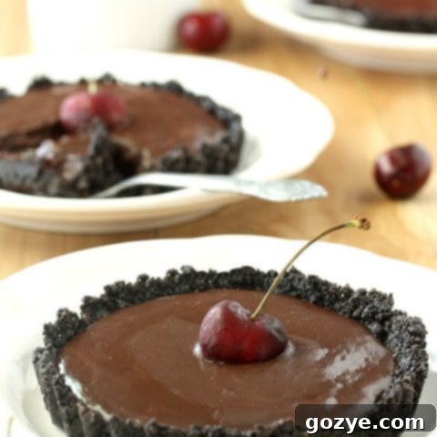 No Bake Chocolate Cherry Tartlets on a white plate