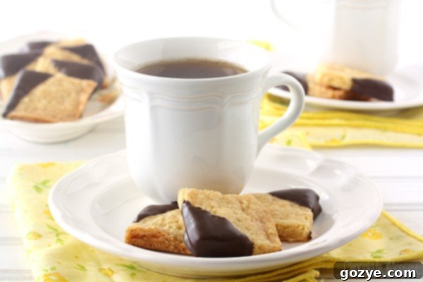 A selection of Chocolate-Dipped Orange Shortbread Cookies ready for a tea party
