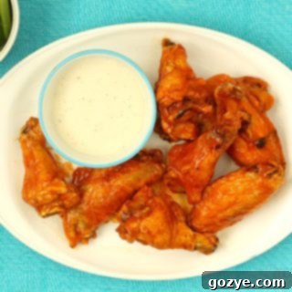 The Ultimate Baked Buffalo Wings 4 Baked Buffalo Chicken Wings, freshly made and ready to serve