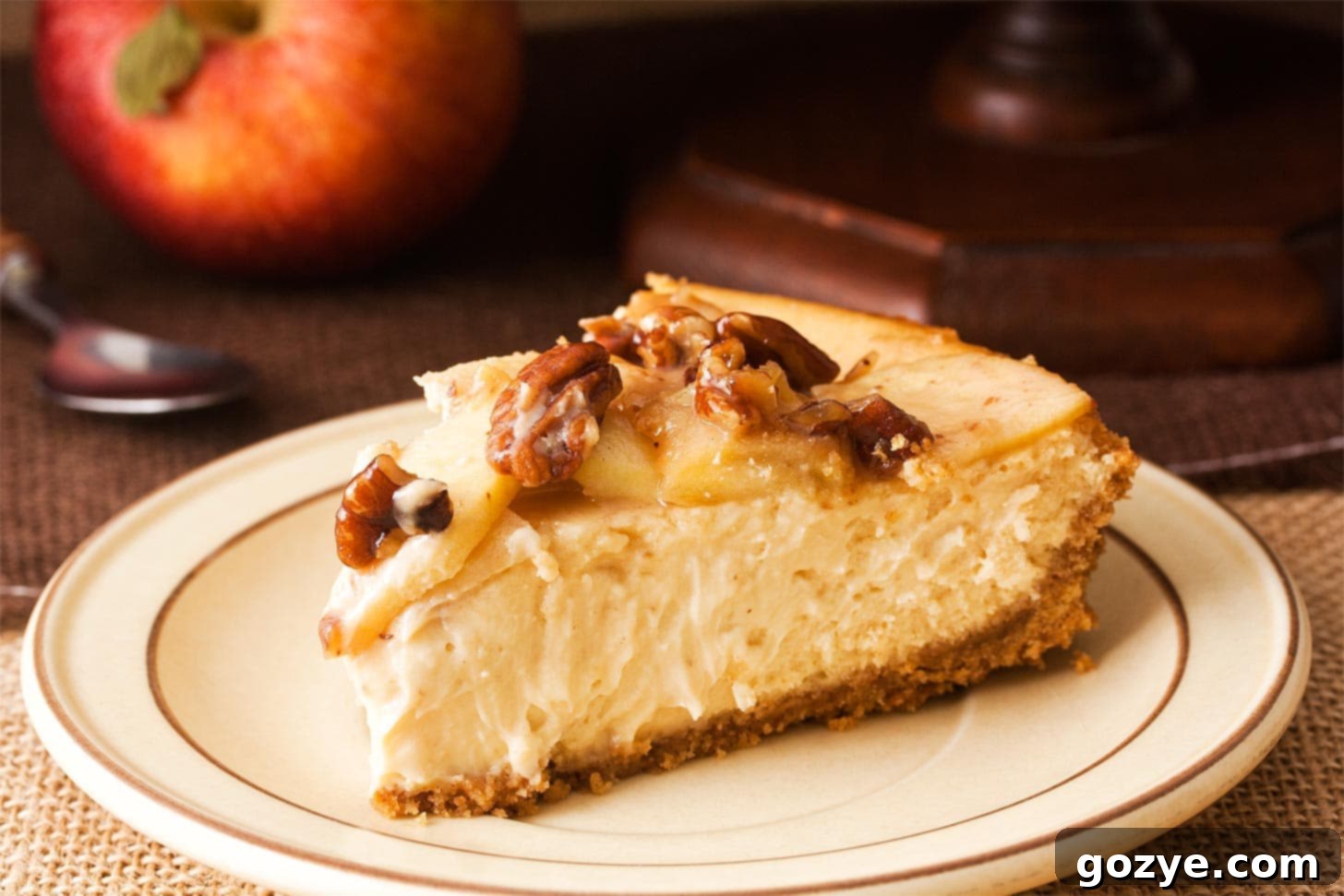 Slice of caramel apple cheesecake