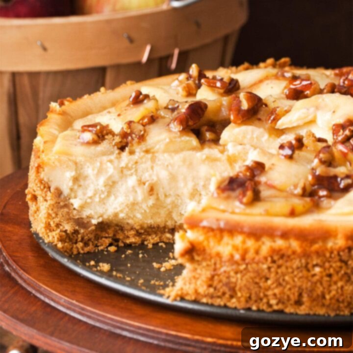 Close up of caramel apple cheesecake with a slice missing
