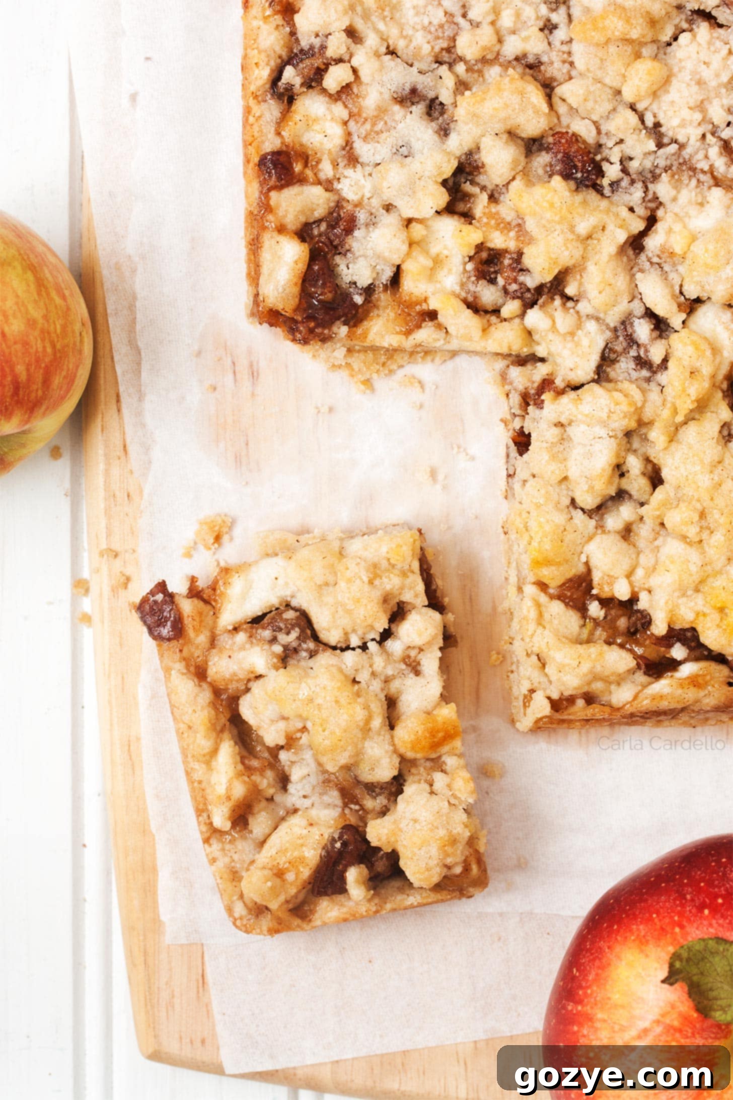 Apple Crumble Bar cut into bars, showcasing the layers of crumb and apple filling