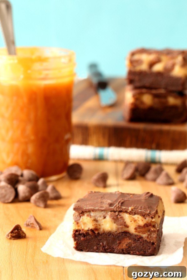 Caramel Chocolate Chip Cookie Dough Brownies, a perfect layered dessert.
