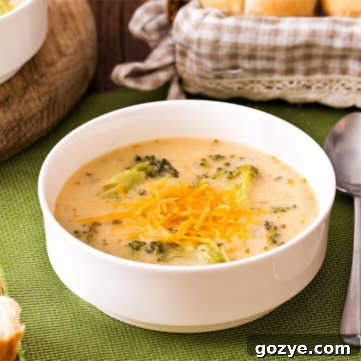 Broccoli Cheddar Soup for two in a white bowl