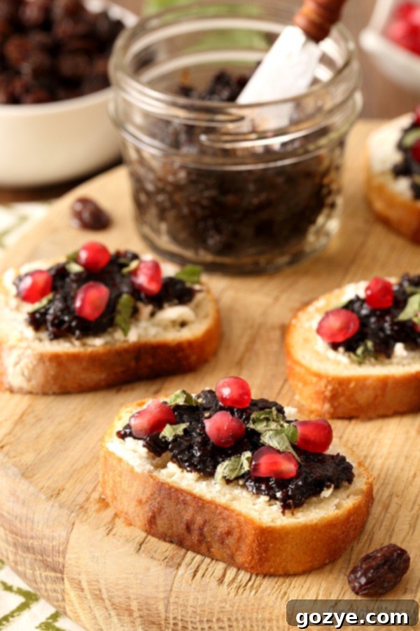 Sweet Raisin Jam and Creamy Goat Cheese Crostini 5 Raisin Jam and Goat Cheese Crostini with pomegranate seeds and fresh basil