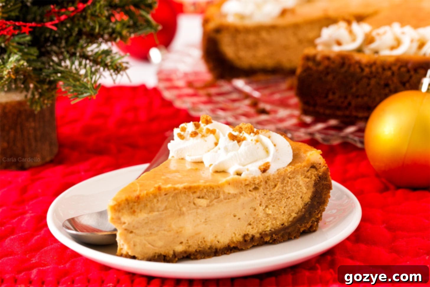 Festive Gingerbread Cheesecake 4 Slice of gingerbread cheesecake with Christmas decorations