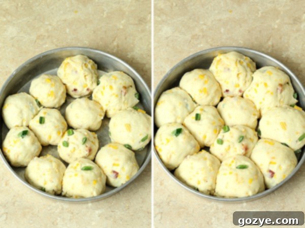 Creamy Jalapeno Rolls 8 Jalapeño Popper Stuffed Dinner Rolls rising in a baking pan