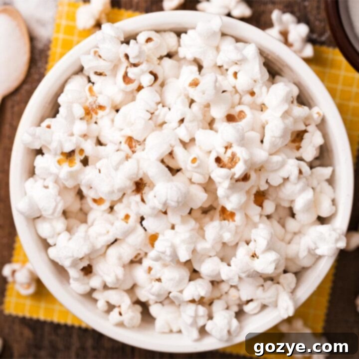 A large bowl of Salt and Vinegar Popcorn, perfectly seasoned for a tangy snack.