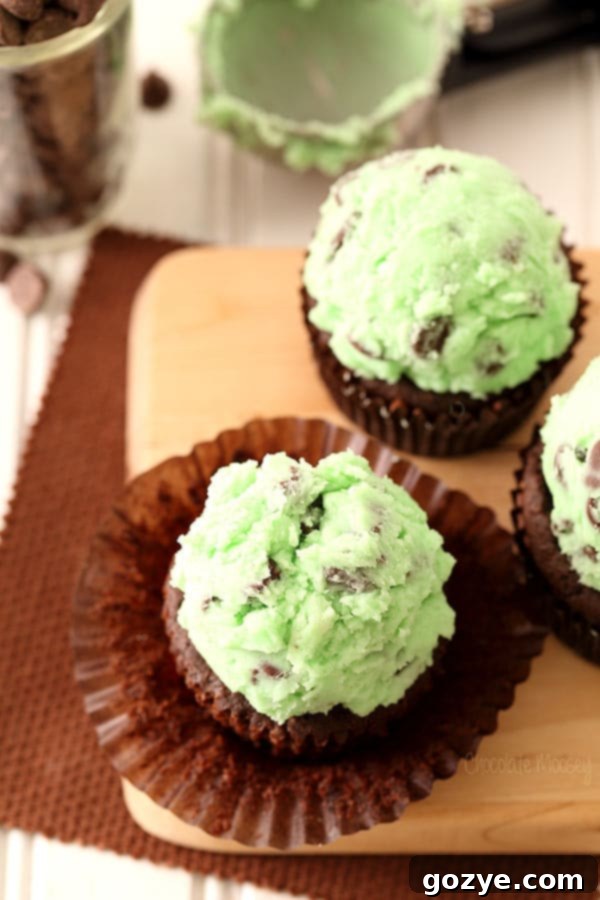 Mint Chocolate Chip Cupcake unwrapped with mint frosting