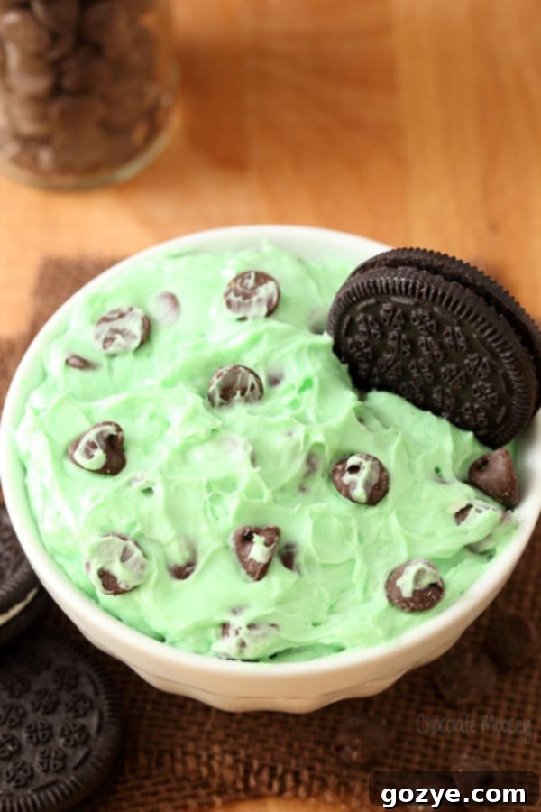 Cool Mint Chip Cheesecake Delight 4 Mint Chocolate Chip Cheesecake Dip in a bowl with chocolate cookies