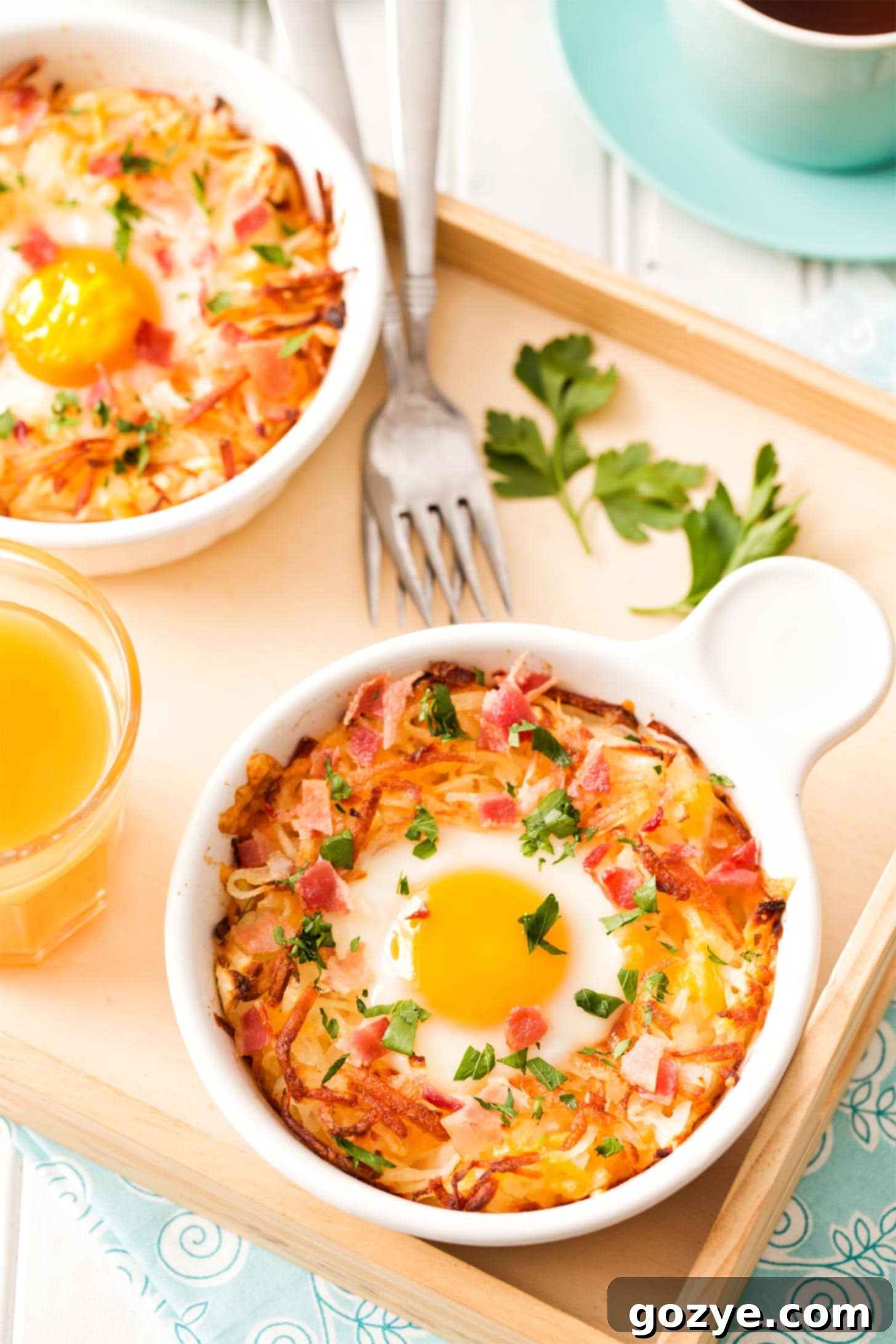 Hash brown and egg mixture prepared in a ramekin, ready for baking