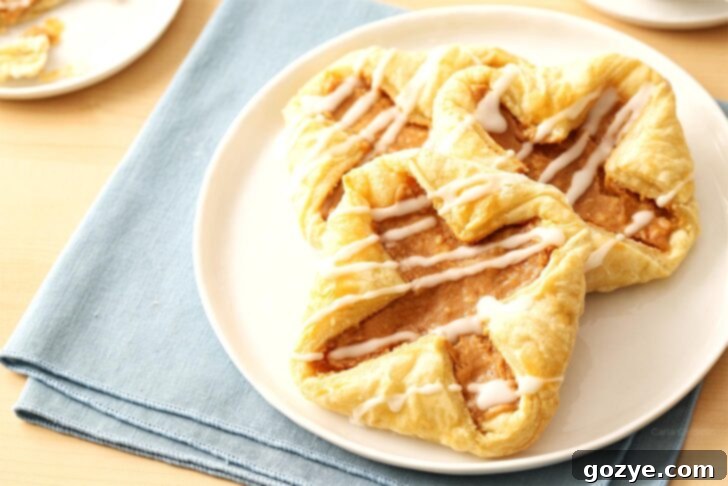 Flaky Danish Pastries 4 Close up of puff pastry danish on white plate