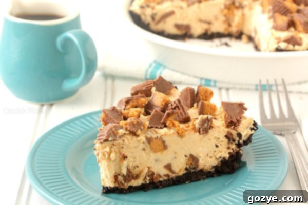 Slice of peanut butter pie on teal plate