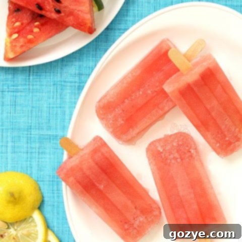Vibrant Watermelon Margarita Popsicles, both alcoholic and non-alcoholic versions, beautifully presented and ready to enjoy