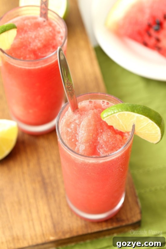Ultimate Watermelon Chill 3 Watermelon Slushie in two glasses with spoons