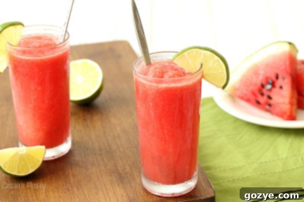 Ultimate Watermelon Chill 6 Watermelon Slushies in two glasses with spoons