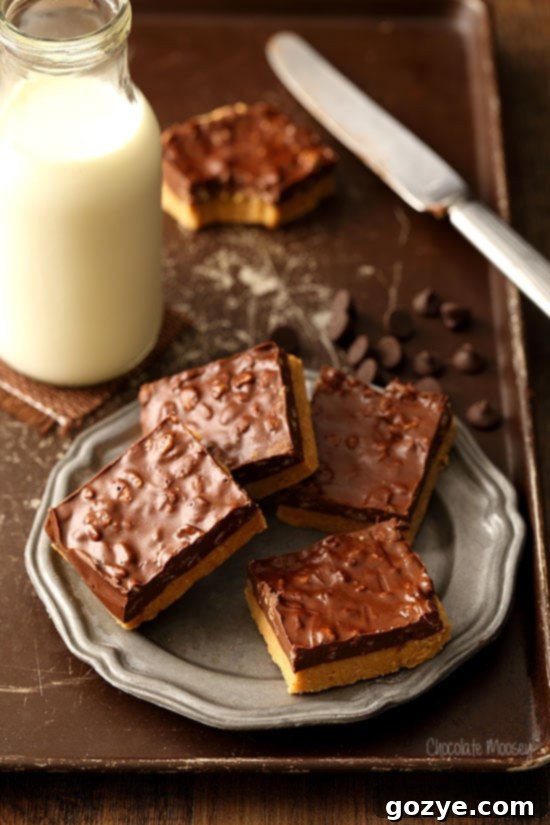 Easy No Bake Chocolate Peanut Butter Bars with a little bit of crunch from rice krispie cereal