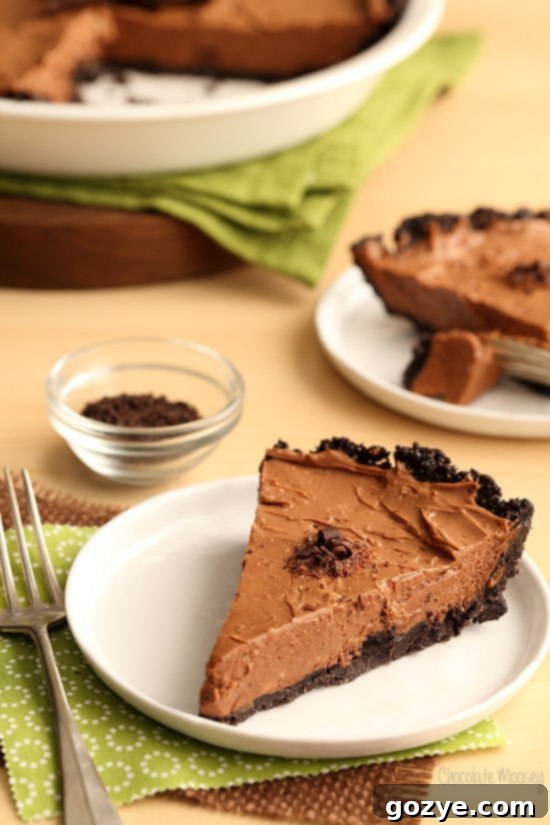 Slice of no bake chocolate pie on a white plate