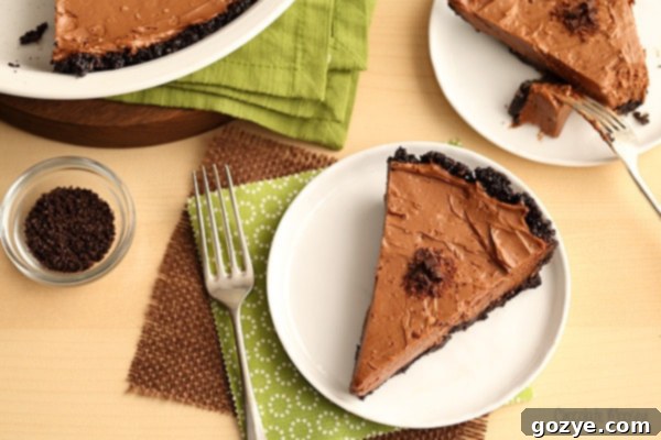 Slice of no bake chocolate pie on a white plate