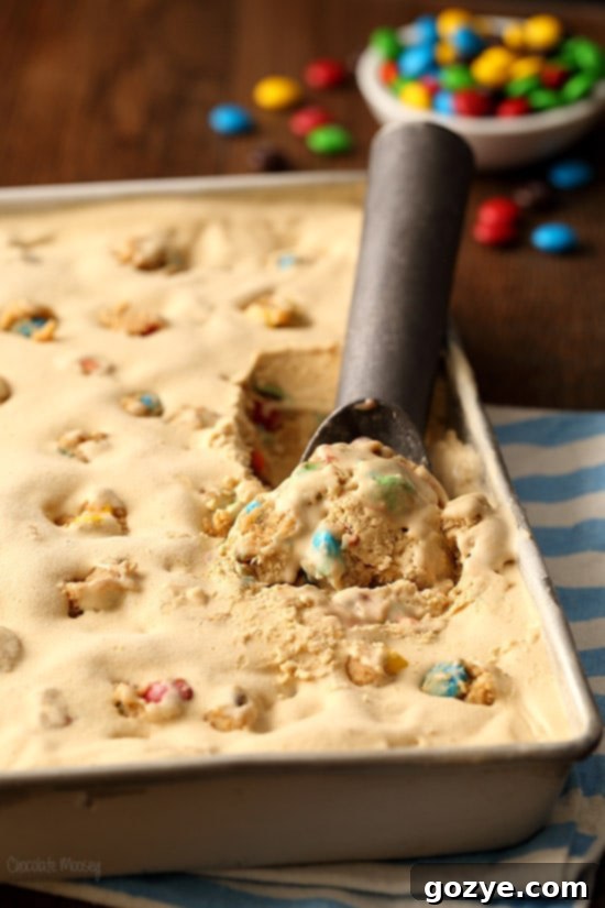 Close-up shot of M&M Cookie Dough Ice Cream with visible M&Ms and cookie dough chunks