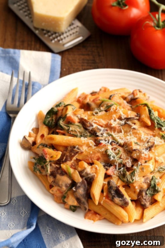 Creamy Tomato and Mushroom Pasta with spinach and homemade tomato sauce