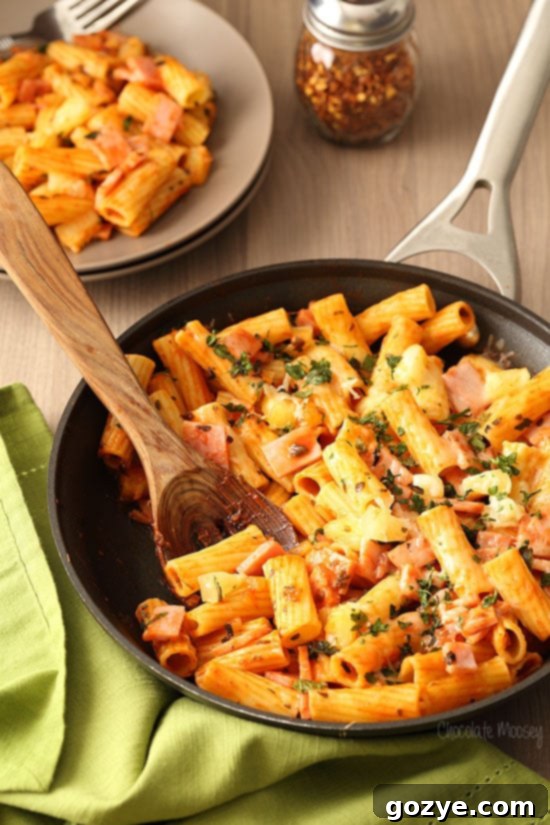 Hawaiian Pizza Pasta made with homemade tomato sauce, ham, pineapple, and mozzarella cheese