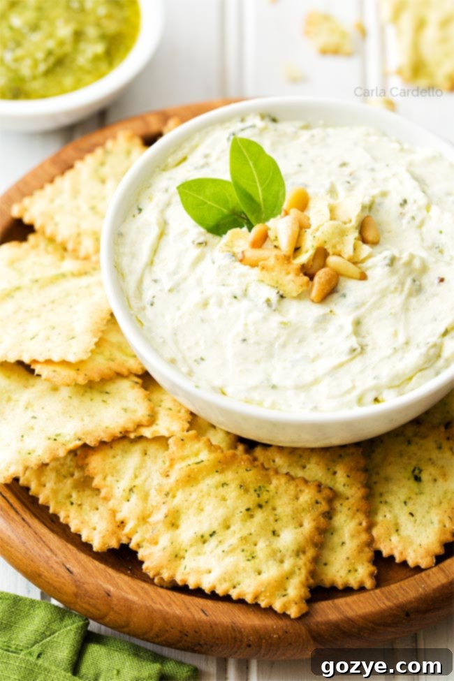 Pesto Dip in white bowl with chips