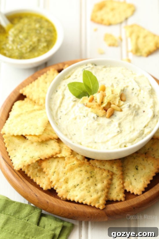 Pesto Dip in white bowl with chips
