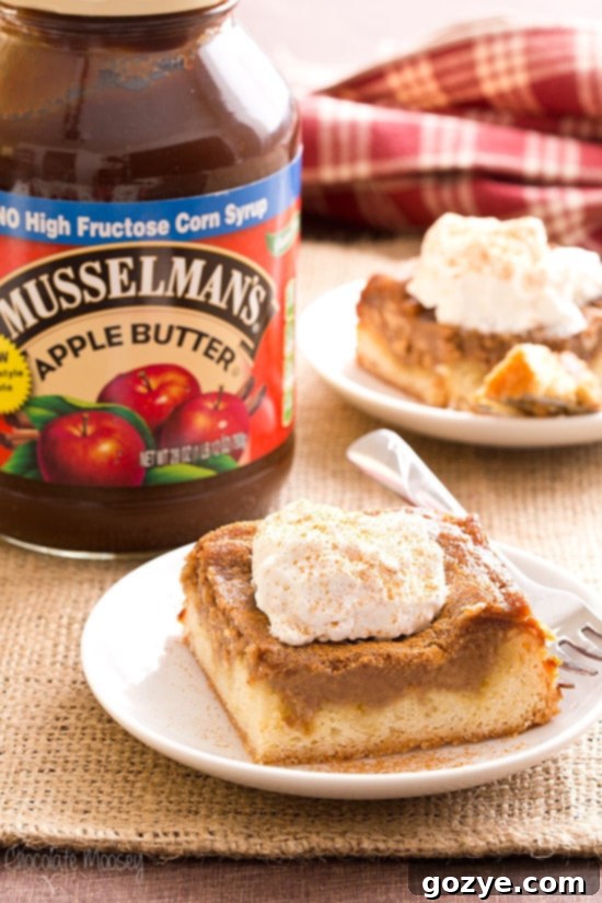 Apple Butter Gooey Butter Cake close up, showing the distinct layers and gooey texture