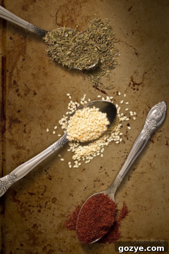 Close-up of Za'atar Spice Mix, showcasing sumac, sesame seeds, and dried herbs