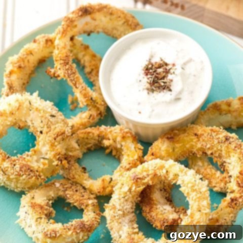 Za'atar Baked Onion Rings on a wooden board