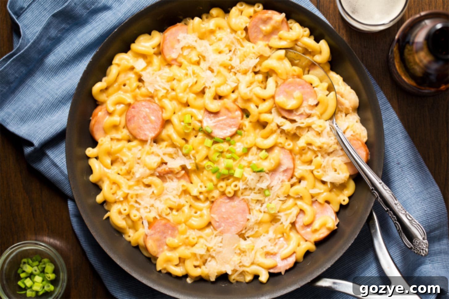 Stovetop mac and cheese with kielbasa in skillet