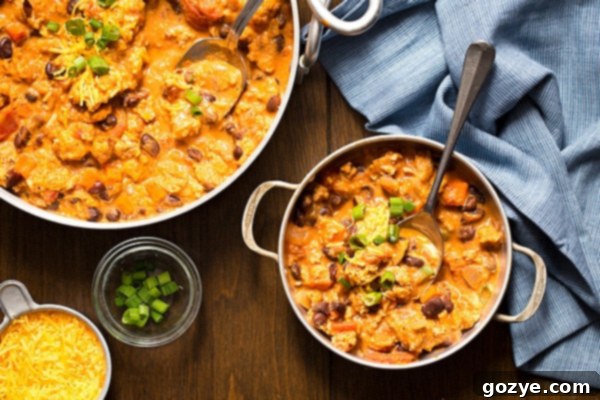 Hearty Buffalo Chicken Chili 4 Recipe for Buffalo Chicken Chili in small bowl with a spoon