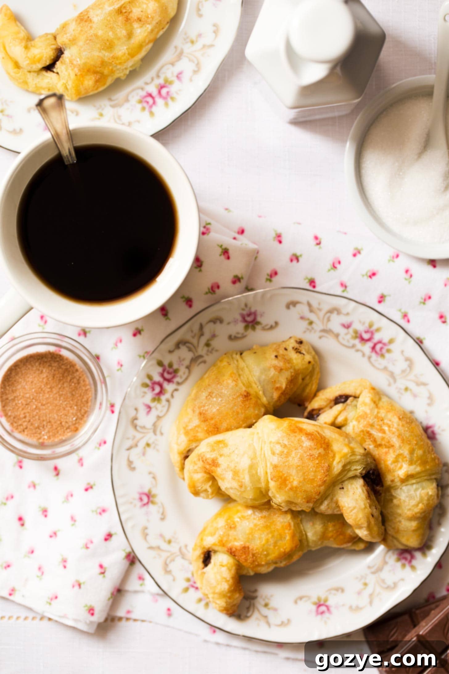Chocolate Stuffed Croissants piled onto plate