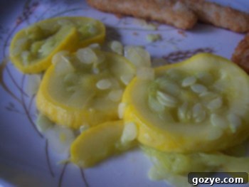 Close-up of fresh, sliced yellow squash, ready for cooking.