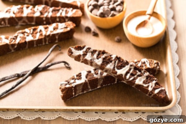 Close-up of freshly baked Brownie Biscotti with elegant vanilla bean glaze.