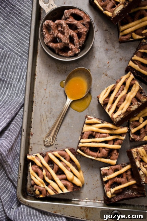 Fudgy Chocolate Covered Pretzel Caramel Brownies with a rich caramel glaze
