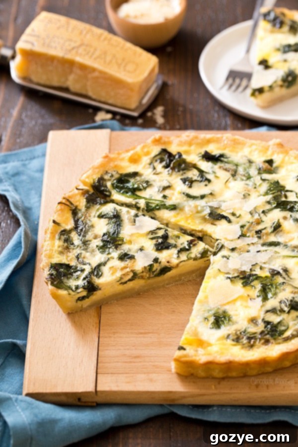 Slice of Quiche Florentine on a plate